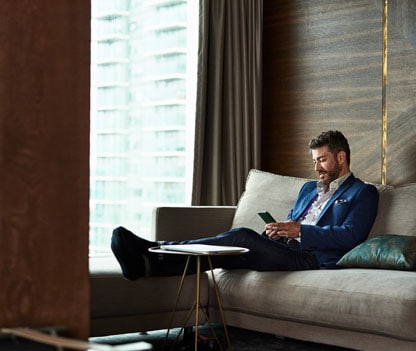 man-holding-blue-phone